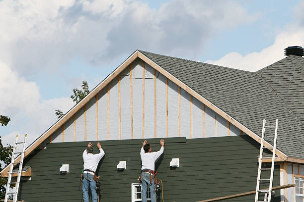 Professional Siding technician working in Louisville, GA